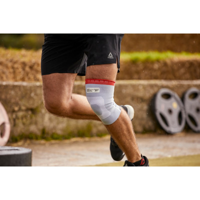Фіксатор коліна Reebok Speedwick Knee Support білий, червоний RRSU-14323 S (885652015905)