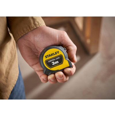 Рулетка Stanley CONTROL-LOCK, 3мх19мм, у прогумованому корпусі, з двосторонньою шкалою (STHT37230-0)